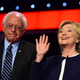 Presidential hopeful Hillary Clinton (right) gestures while standing beside Bernie Sanders during the first Democratic presidential debate in Las Vegas on Oct. 13, 2015.
FREDERIC J. BROWN/AFP/Getty Images